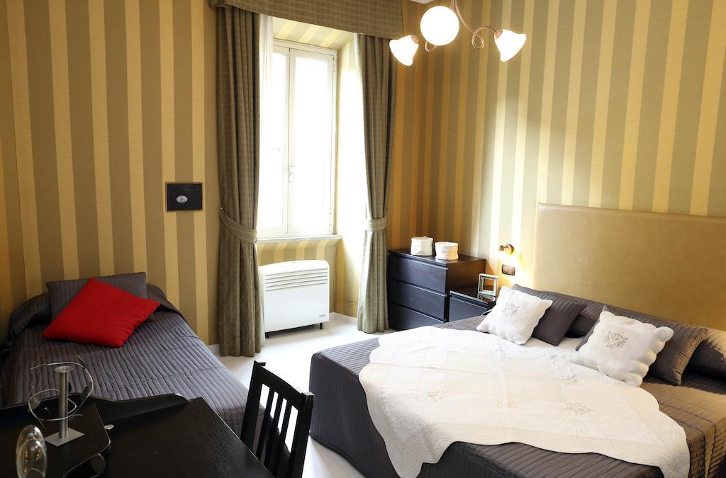 Caracciolo Guest House Rome Ruang foto
